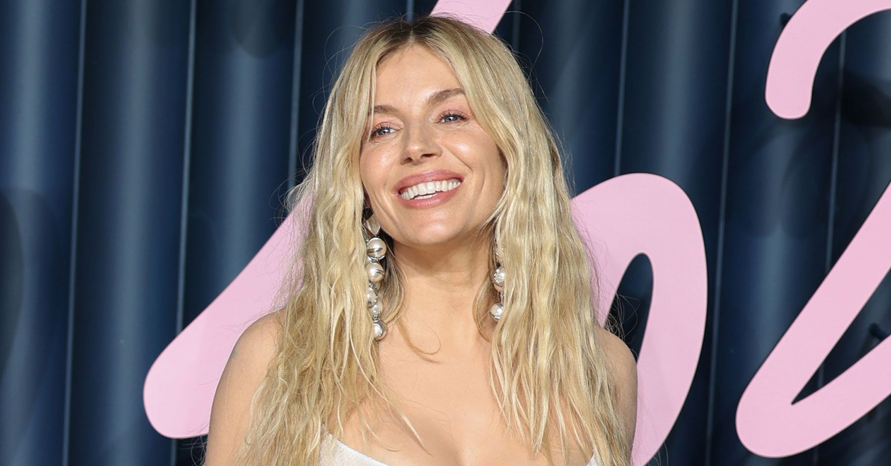 Sienna Miller Just Staged a Pregnancy Reveal in a 100% Sheer Dress on the Red Carpet