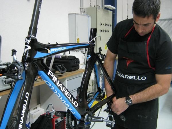 David Fernandez works on a TT bike