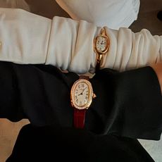 @annelauremais and a friend wear Cartier Baignoire watches