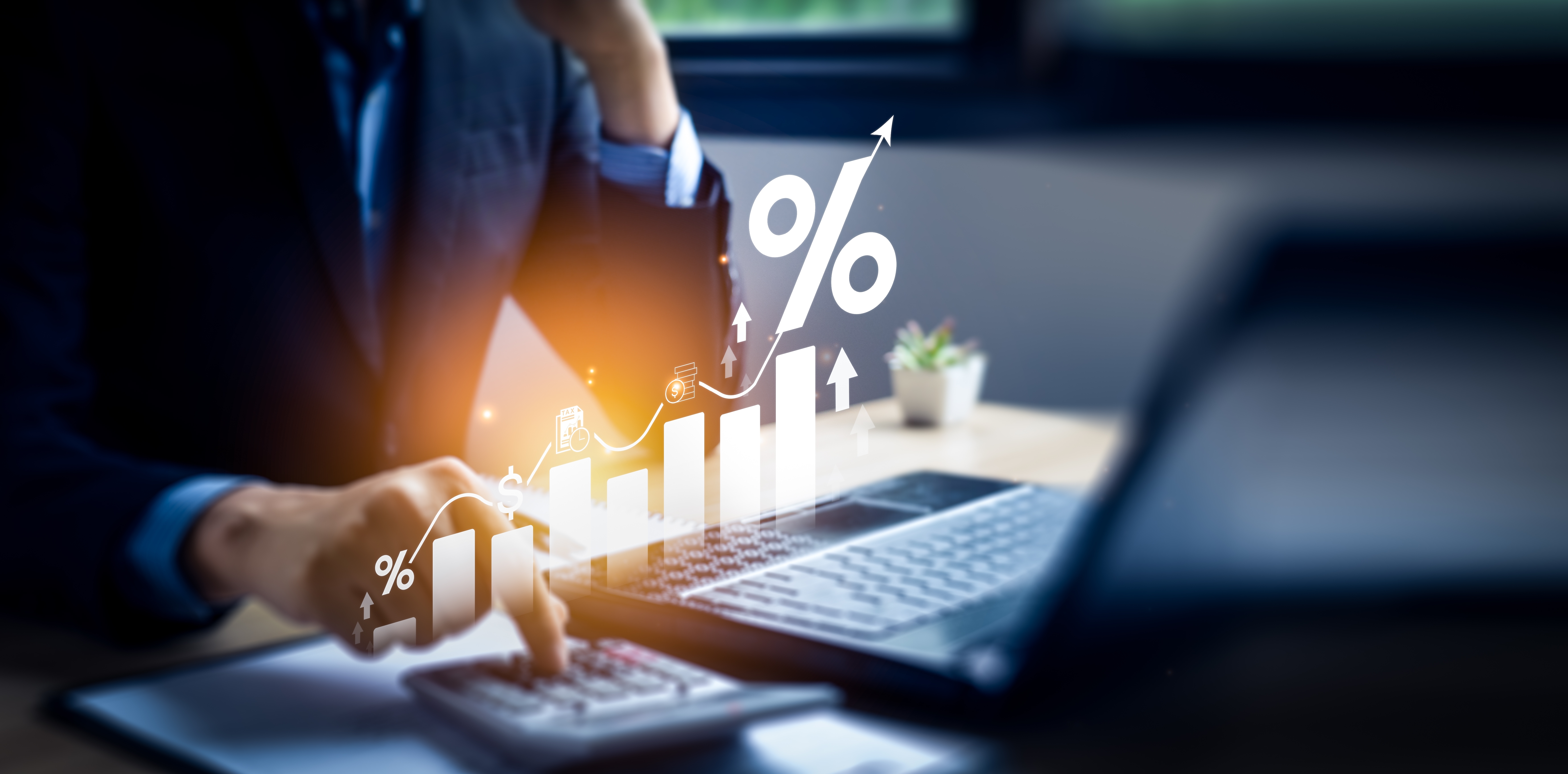 A small business owner calculating income and return on investment in percentage using a calculator from a home office.