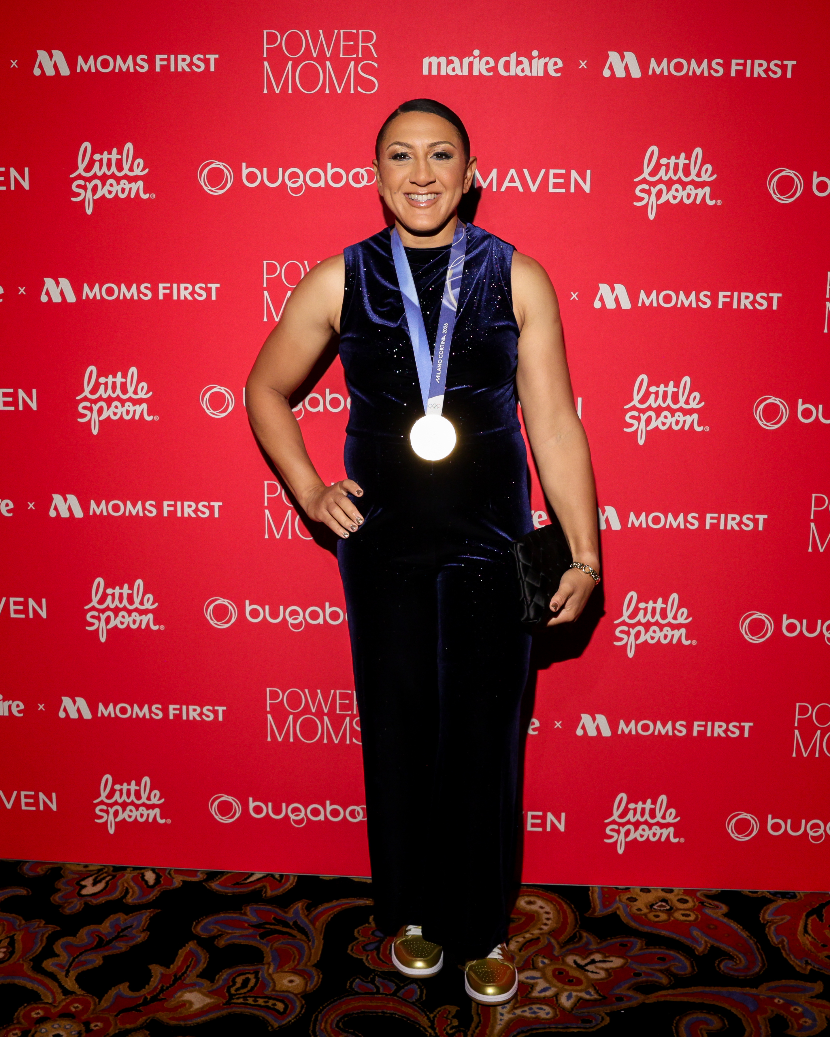 Elana Meyers Taylor wore a velvet column dress at the Power Moms 2026 event