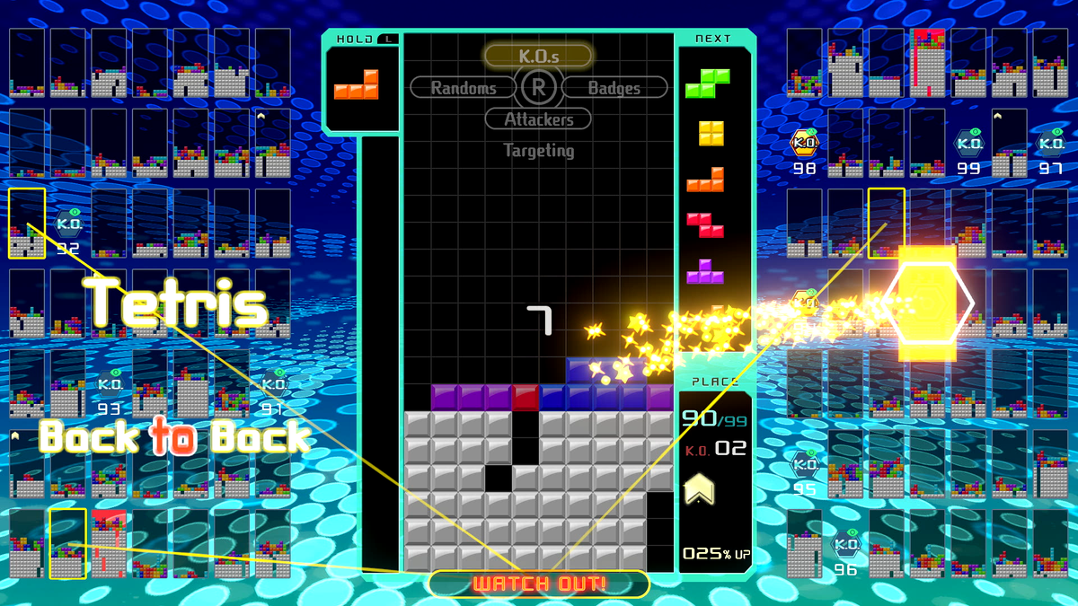 A Tetris 99 board with 98 smaller ones, three of them about to attack