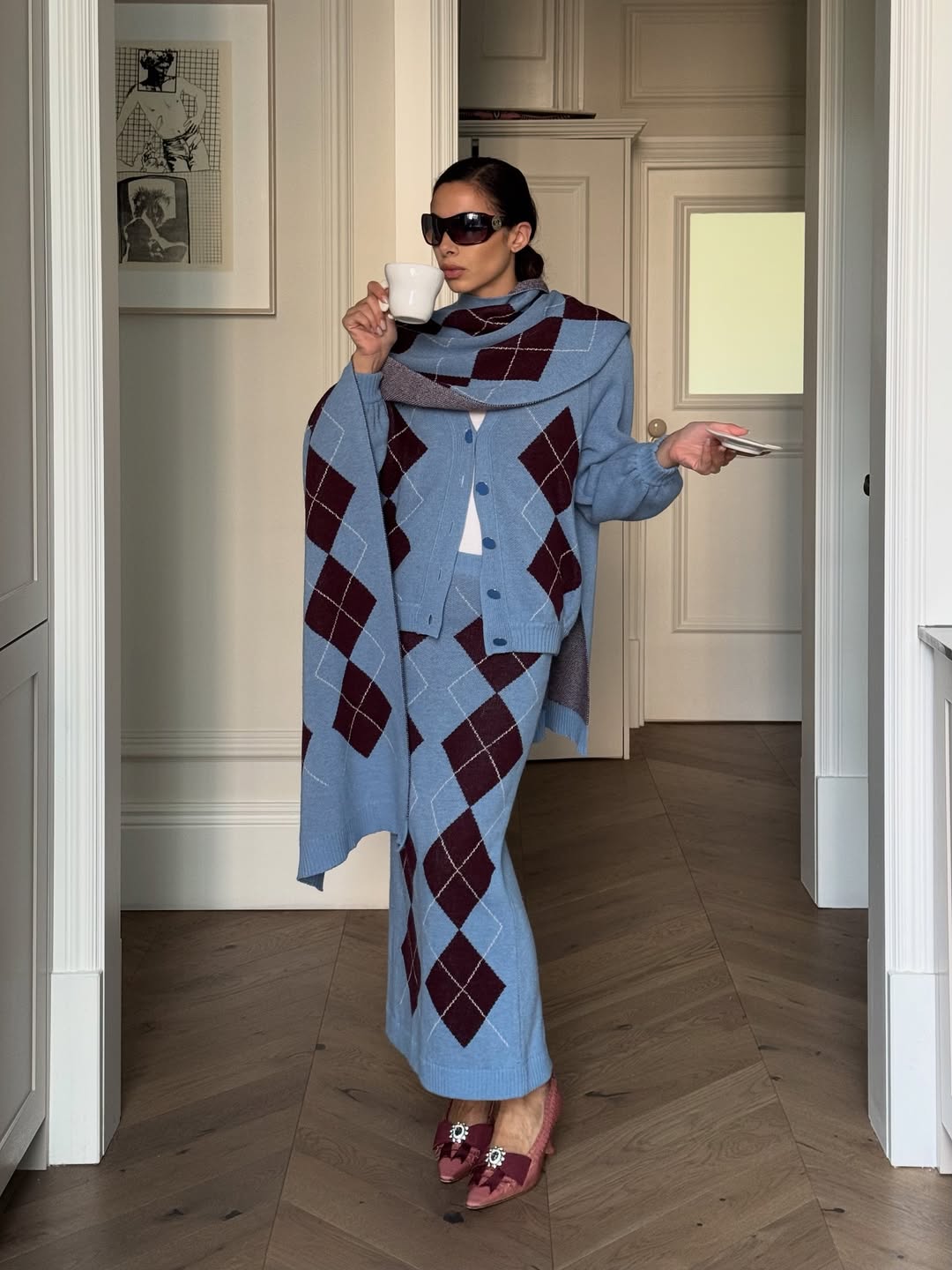 federica labanca posing in an argyle knitted outfit and manolo blahnik shoes