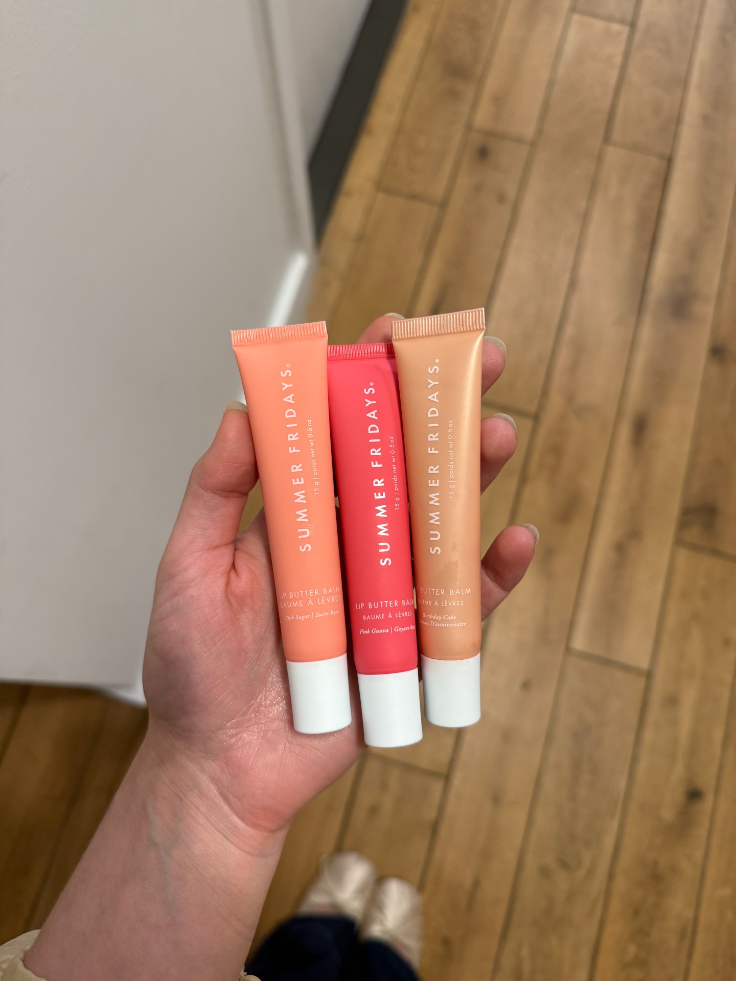 Jamie Schneider testing Summer Fridays Lip Butter Balms.