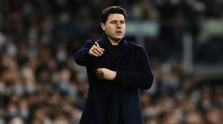 PSG head coach Mauricio Pochettino gives instructions to his team during the UEFA Champions League last 16 second leg match between Real Madrid and PSG at the Santiago Bernabeu on March 9, 2022 in Madrid, Spain.