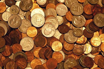 Insurance company pays $21,000 of settlement in massive buckets of change