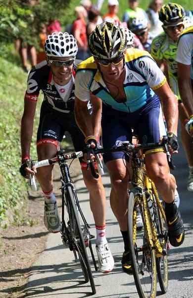 Two Tour de France champions Carlos Sastre (Cervelo TestTeam) and Lance Armstrong (Astana) in action during stage 10.