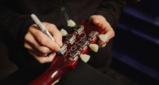 Gibson ‘84 Les Paul Standard with Bigsby, Signed by Johnny Marr: the guitar is a replica of the Les Paul Marr first used during the session for the Smiths Meat Is Murder – and it has been a hard-working guitar in his collection. Only 20 will be made, each signed by Marr, with proceeds going to the Teenage Cancer Trust.