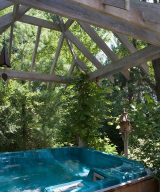 wooden pergola over hot tub