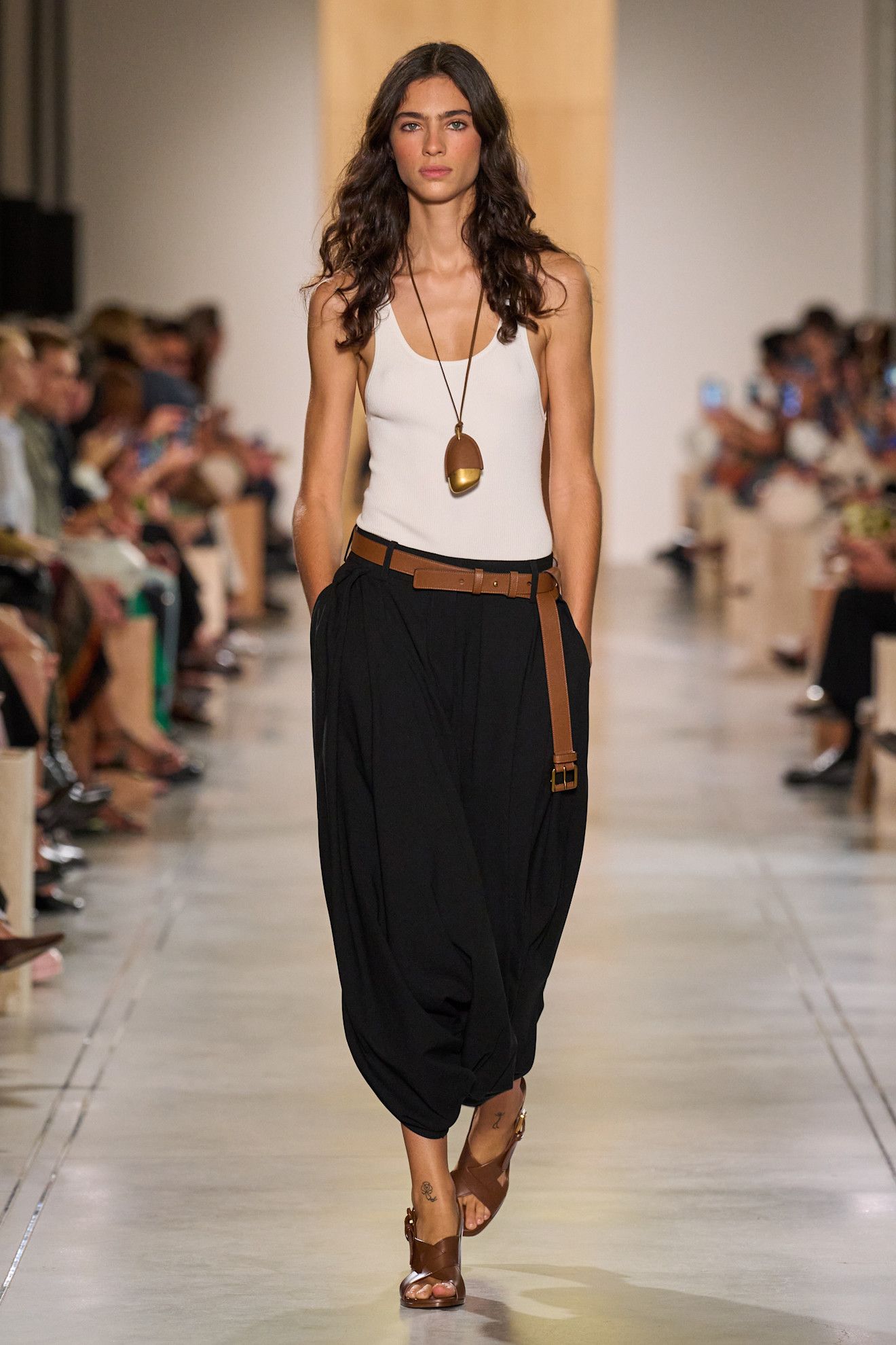 Model walking on the spring/summer 2026 Michael Kors Collection runway.