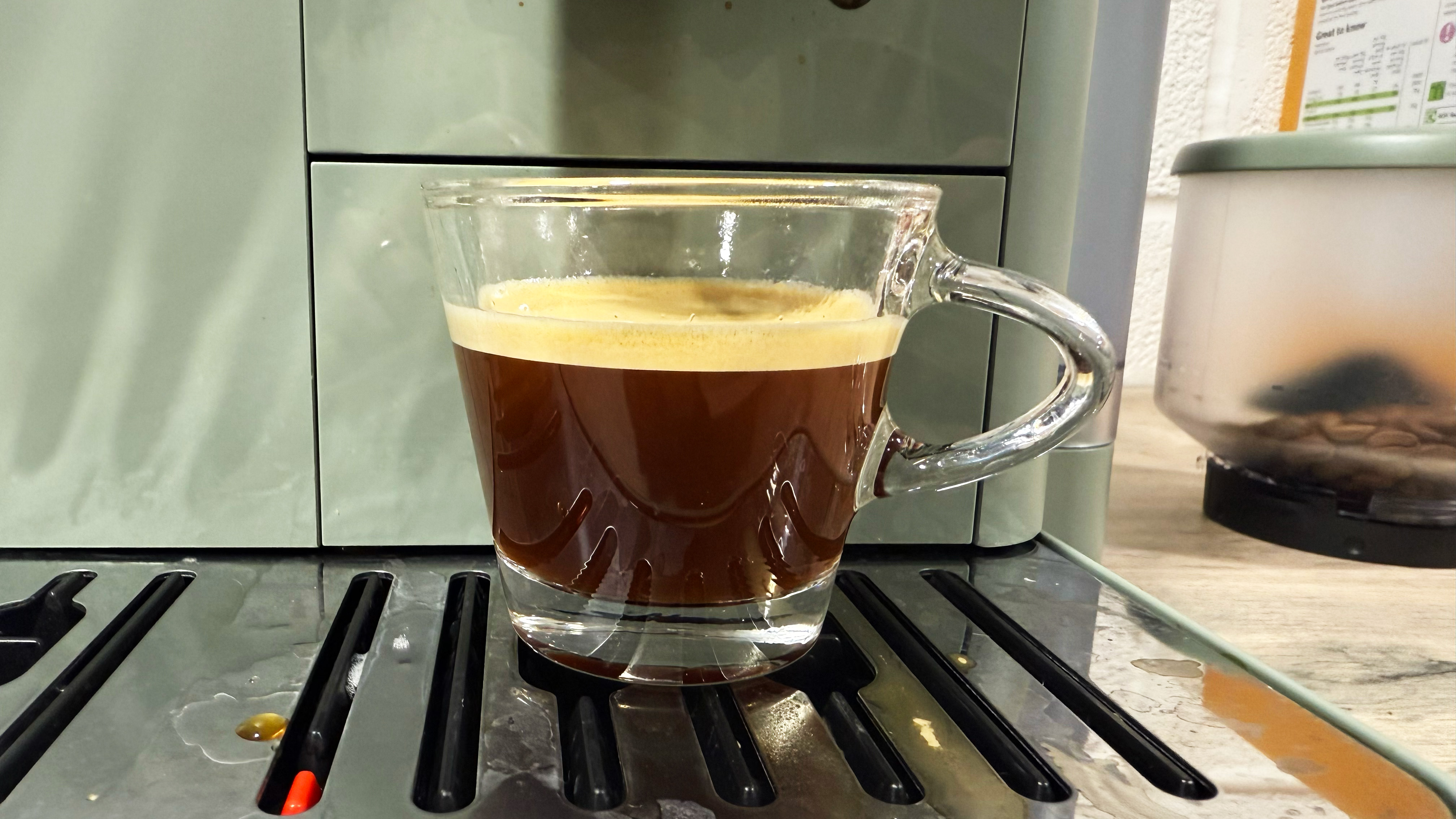 a photograph of an espresso shot made by the delonghi rivelia