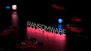 Neon letters spelling RANSOMWARE set against a dark background with red and blue circuitry