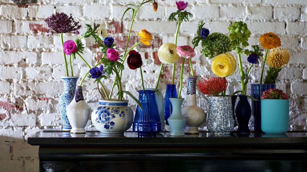 Jars of ranunculus flowers