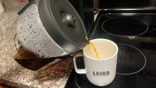 pouring coffee from the keurig k-duo carafe
