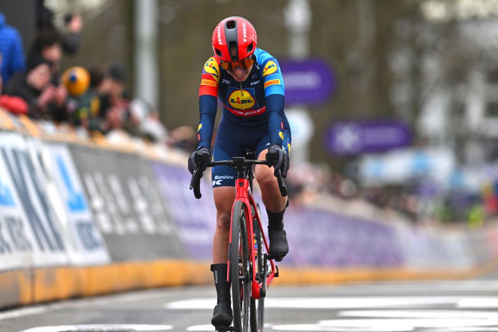 NINOVE BELGIUM FEBRUARY 24 Shirin Van Anrooij of The Netherlands and Team LidlTrek crosses the finish line during the 16th Omloop Het Nieuwsblad 2024 Womens Elite a 1271km one day race from Ghent to Ninove UCIWWT on February 24 2024 in Ninove Belgium Photo by Luc ClaessenGetty Images