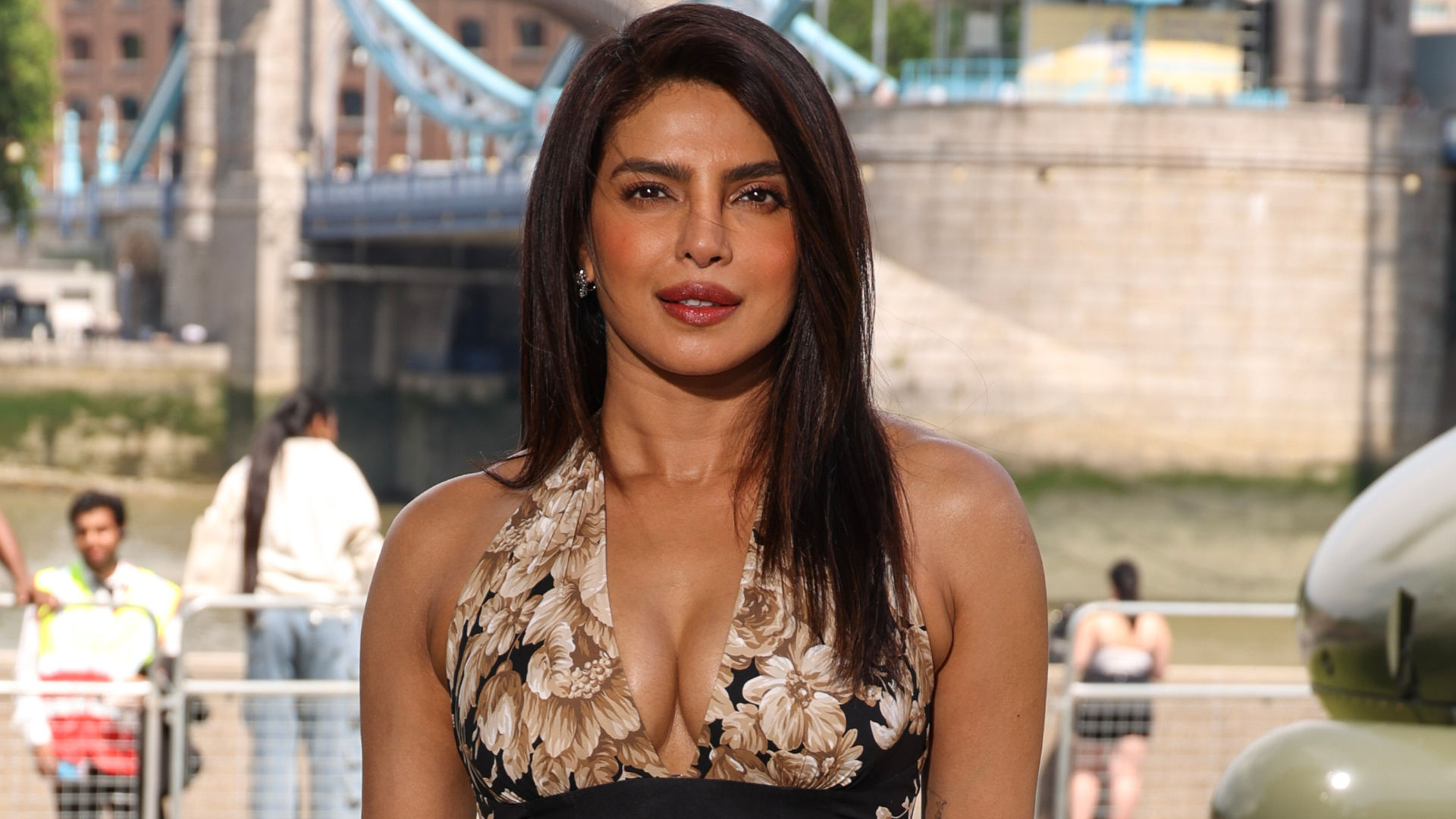 Priyanka Chopra wearing a halter neck dress and posing for the camera.