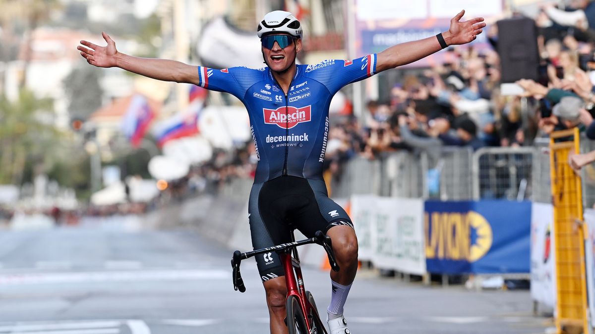 Mathieu Van Der Poel of The Netherlands crosses the finish line on his bike ahead of the Milano-Sanremo 2025 race.