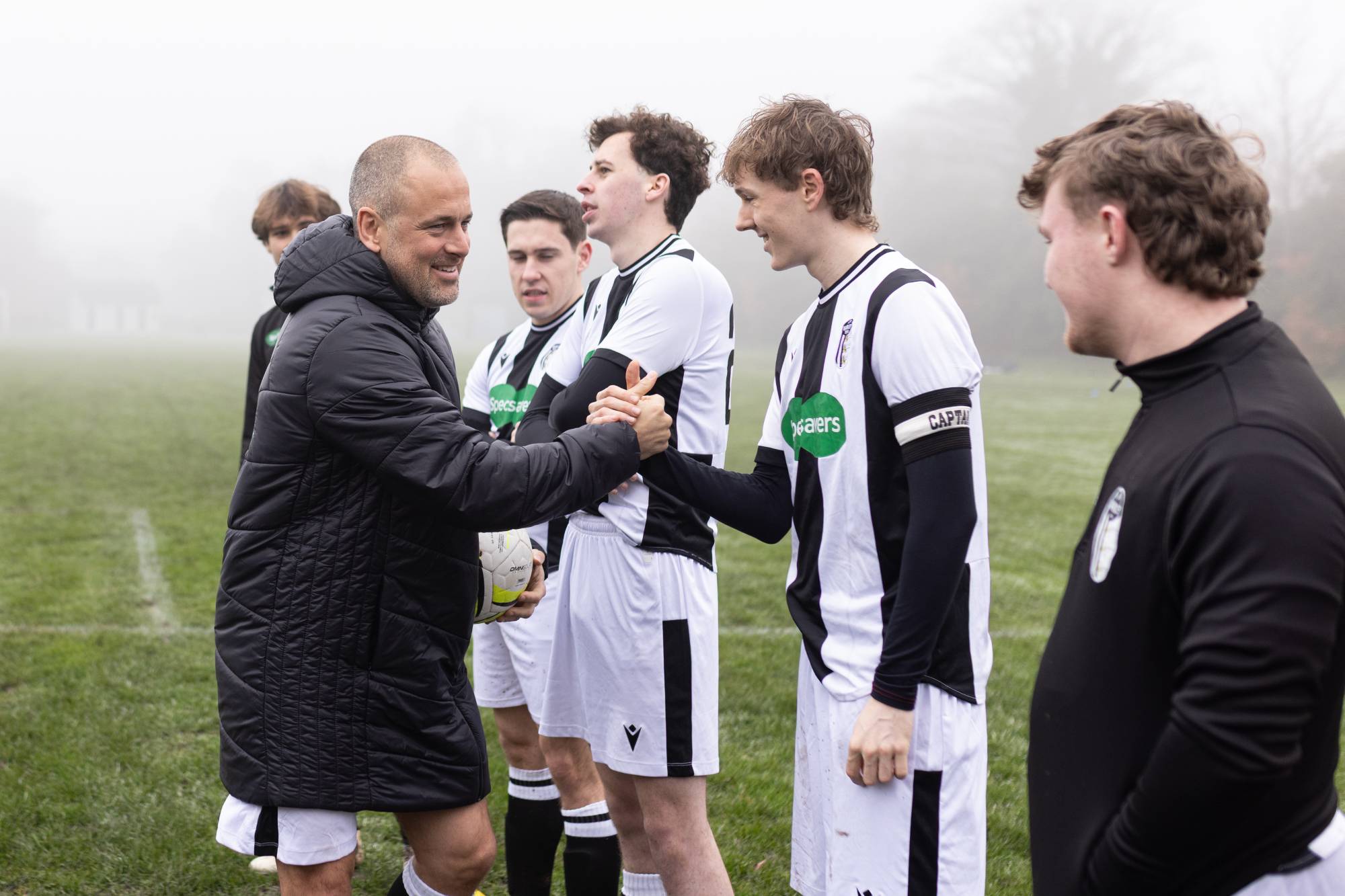 Joe Cole greets his FC Warley team-mates