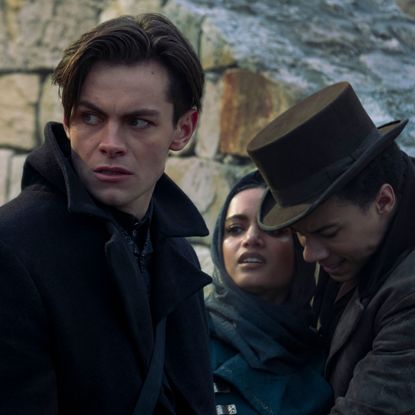shadow and bone l to r freddy carter as kaz brekker, amita suman as inej ghafa and kit young as jesper fahey in shadow and bone cr david applebynetflix © 2021
