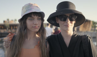 Melisa Sözen and Eylül Tumbar wearing hats as Mother and Bambi