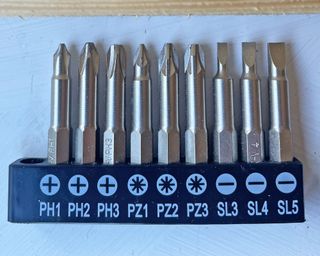 A selection of different sized replacement screwdriver heads for electric screwdriver