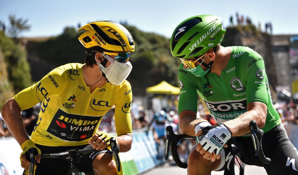 Team Jumbo rider Slovenias Primoz Roglic L and Team Bora rider Slovakias Peter Sagan wait prior to the start of the 10th stage of the 107th edition of the Tour de France cycling race 170 km between Le Chateau dOleron and Saint Martin de Re on September 8 2020 Photo by AnneChristine POUJOULAT AFP Photo by ANNECHRISTINE POUJOULATAFP via Getty Images