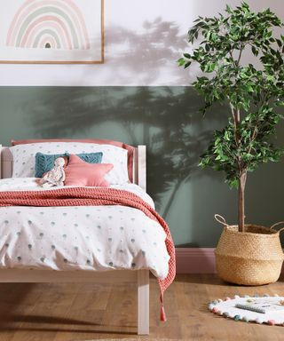 Pink girls bedroom with potted plant by Furniture and Choice
