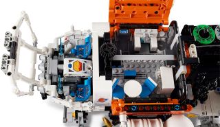 closeup of a lego rover set, showing the vehicle's interior from above