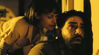 Rahul Kohli and Carla Gugino in The Fall of The House of Usher
