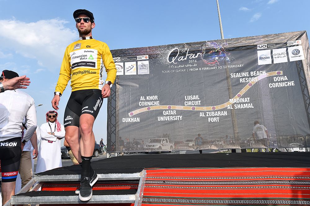 Mark Cavendish makes his way off the podium