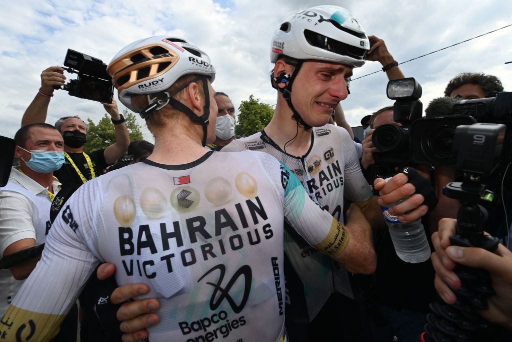 Bahrain Victorious Slovenian rider Matej Mohoric R celebrates with a teammate after winning the 19th stage of the 110th edition of the Tour de France cycling race 173 km between MoiransenMontagne and Poligny in the Jura department of centraleastern France on July 21 2023 Photo by Tim De Waele POOL AFP Photo by TIM DE WAELEPOOLAFP via Getty Images