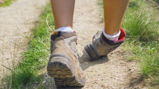 A hiker turning their ankle on the trail