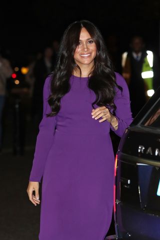 Meghan Markle in a purple dress