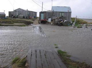 Flooding in the village of Newtok, Alaska, after a storm in 2005.
