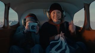 What camera is the cute girl in Boots' Xmas TV ad using to document her journey to the North Pole?