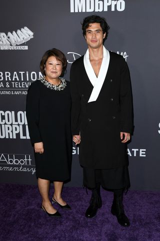 Charles Melton and his mom