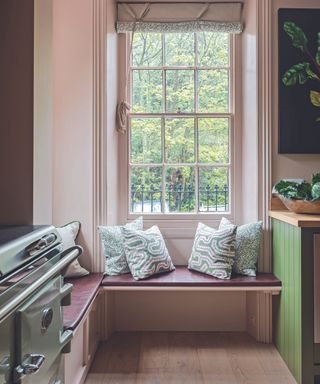 Pink living room with window seat