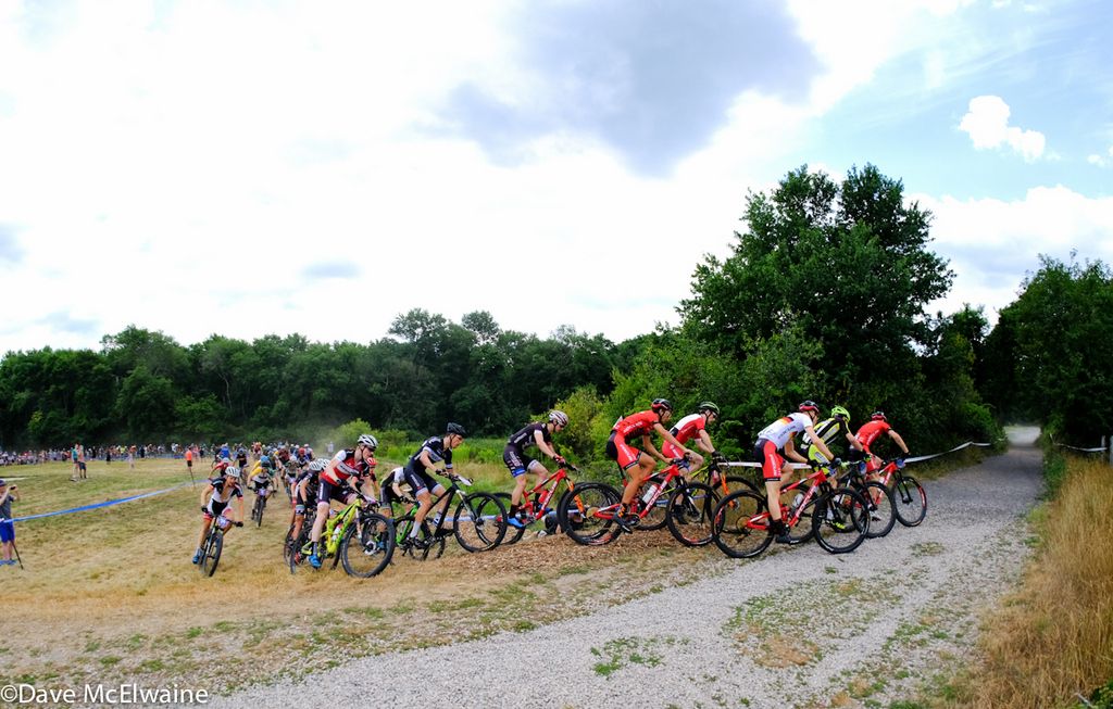 The massive Pro Men&rsquo;s field was quite strung out at the end of the starting loop