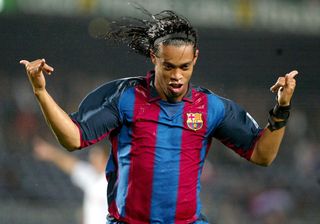 Ronaldinho celebrates a goal for Barcelona against SK Matador Puchov in the UEFA Cup in October 2003.