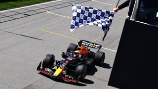 Race winner Max Verstappen of the Netherlands driving the (1) Oracle Red Bull Racing RB18 takes the chequered flag during the F1 Grand Prix of Canada at Circuit Gilles Villeneuve