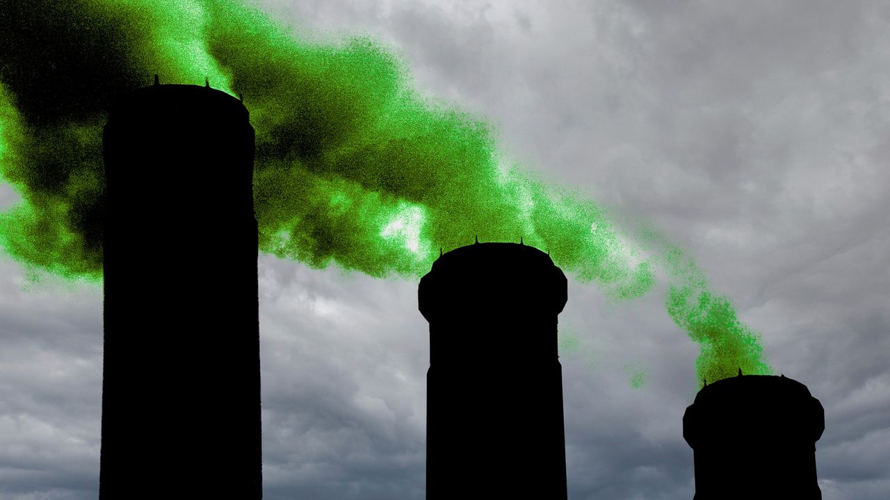 Factory spewing green smoke