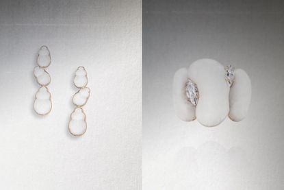 Some earrings and a ring, both made with white precious materials