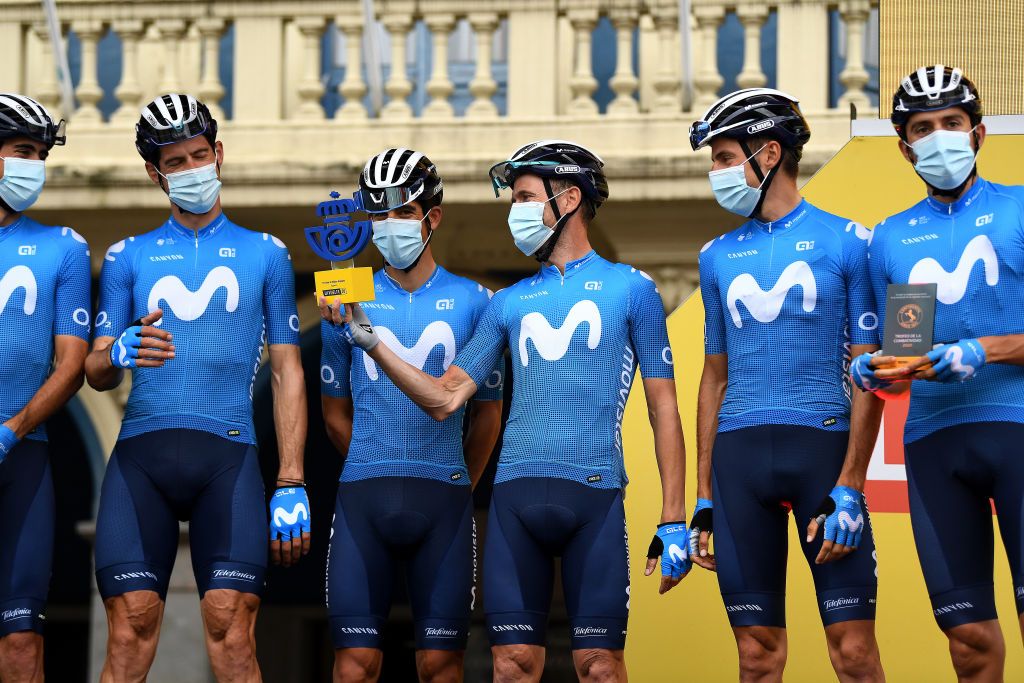 ALTODELANGLIRU SPAIN NOVEMBER 01 Start Jorge Arcas Pena of Spain Imanol Erviti of Spain Nelson Oliveira of Portugal Jose Joaquin Rojas Gil of Spain Marc Soler Gimenez of Spain and Carlos Verona Quintanilla of Spain and Movistar Team Best Team Trophy Mask Covid safety measures Team Presentation during the 75th Tour of Spain 2020 Stage 12 a 1094km stage from Pola de Laviana to Alto de lAngliru 1560m lavuelta LaVuelta20 La Vuelta on November 01 2020 in Alto de lAngliru Spain Photo by David RamosGetty Images
