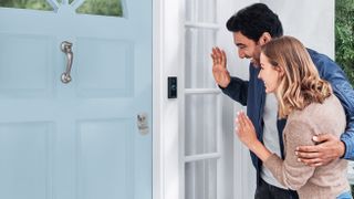 Best video doorbells - couple at door using the Ring Video Doorbell Wired 
