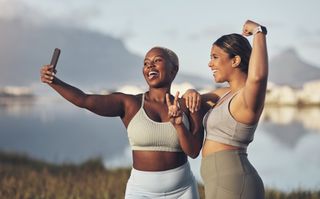 Exercise and mental health: Two woman taking a selfie post-workout
