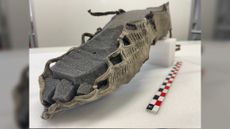 A hiker in the mountains discovered the leather sandal in the ice 