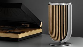 Bang & Olufsen Beolab 8 in wood next to record deck
