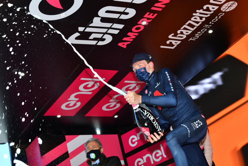 SESTRIERE ITALY OCTOBER 24 Podium Tao Geoghegan Hart of The United Kingdom and Team INEOS Grenadiers Celebration Champagne during the 103rd Giro dItalia 2020 Stage 20 a 190km stage from Alba to Sestriere 2035m girodiitalia Giro on October 24 2020 in Sestriere Italy Photo by Stuart FranklinGetty Images