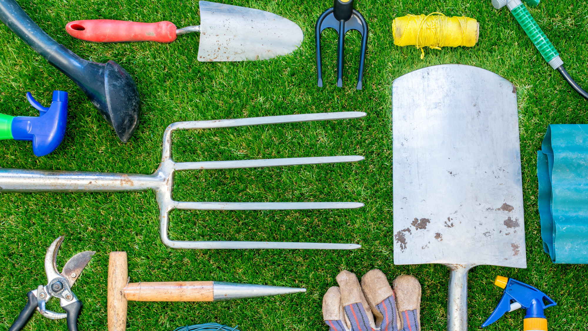gardening tools including fork spade and trowel