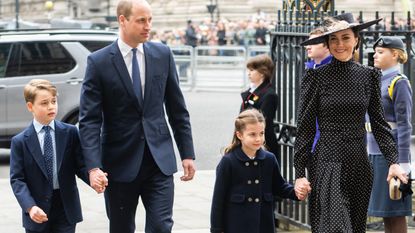 the Cambridge family walking into Westminster Abbey